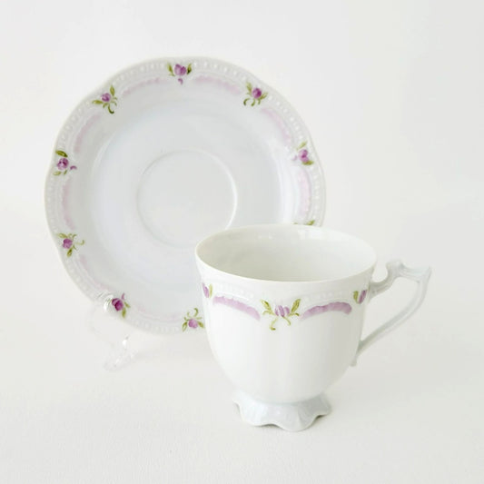 Hutschenreuther Viktoria Teacup & Saucer, White Embossed with Hand Painted Purple & Green Painted Floral, Artist Signed, Germany