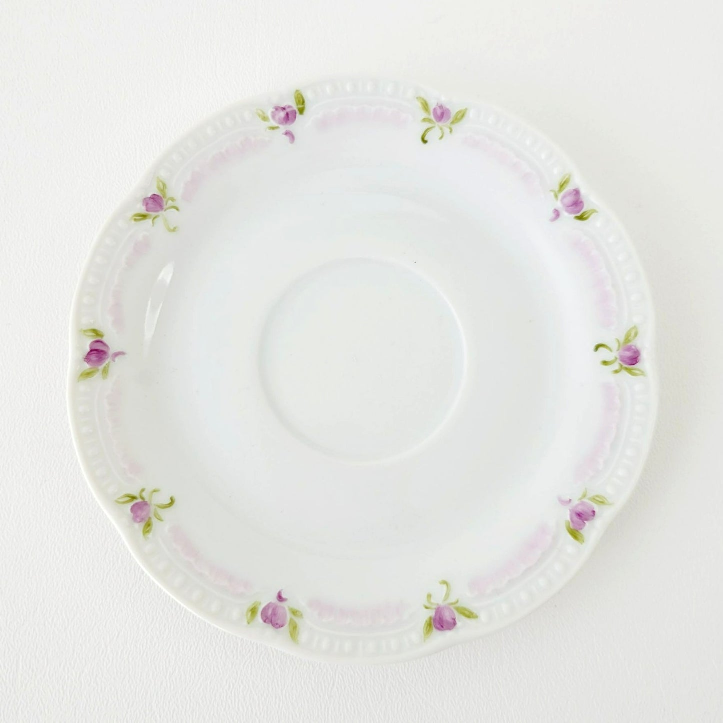 Hutschenreuther Viktoria Teacup & Saucer, White Embossed with Hand Painted Purple & Green Painted Floral, Artist Signed, Germany