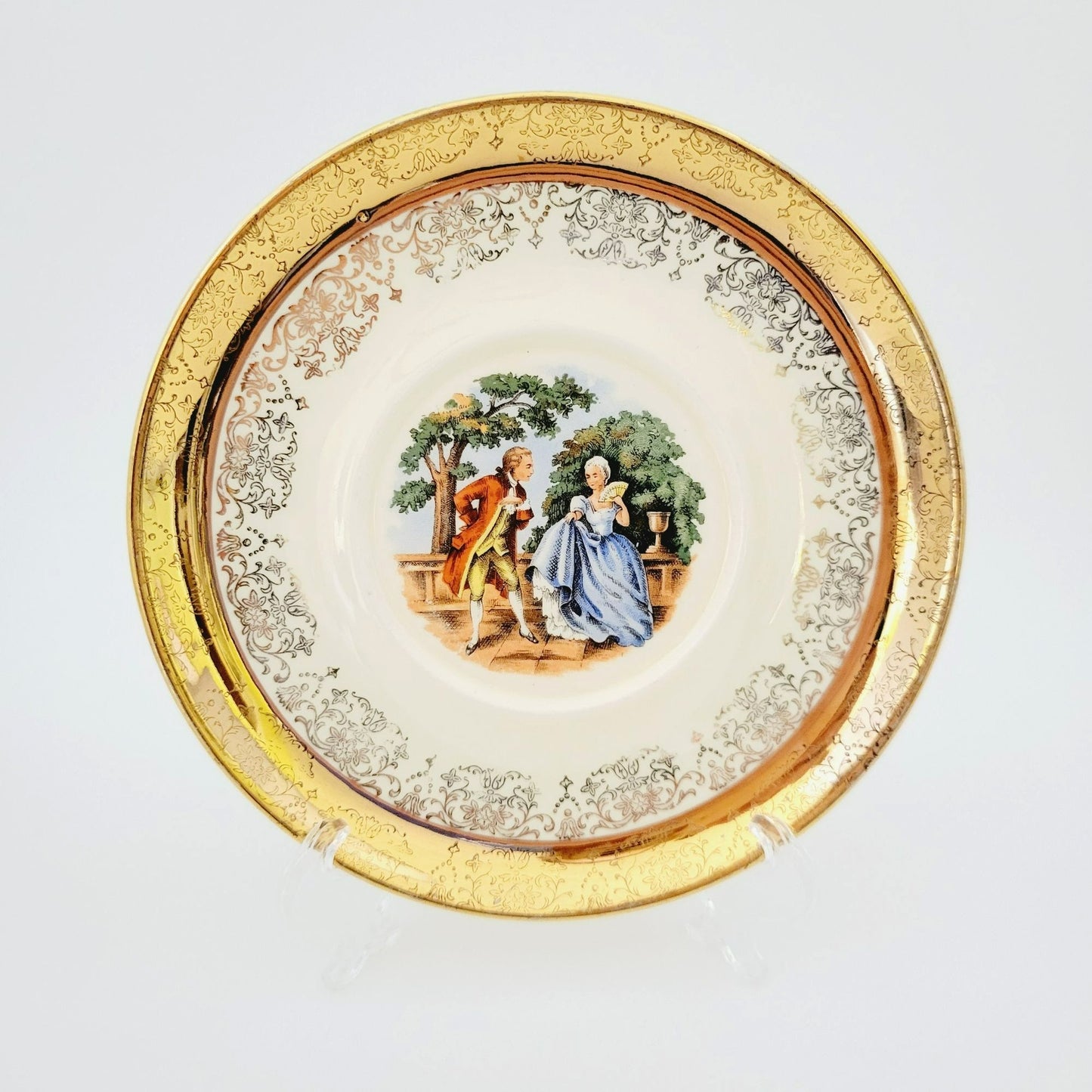 Gold Courting Couple Teacup & Saucer, Rococo Style, by Sabin Crest O Gold with Warranted 22 K Gold Filigree Edge