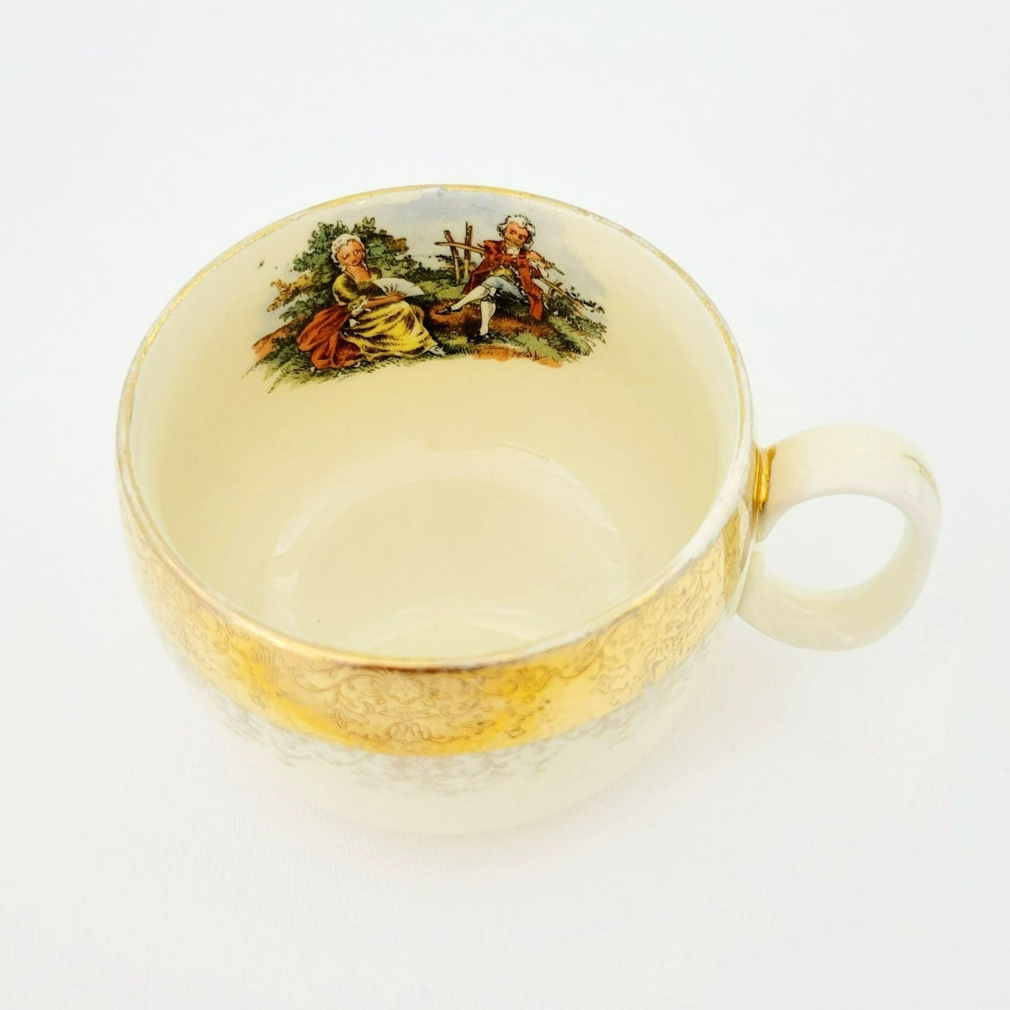 Gold Courting Couple Teacup & Saucer, Rococo Style, by Sabin Crest O Gold with Warranted 22 K Gold Filigree Edge