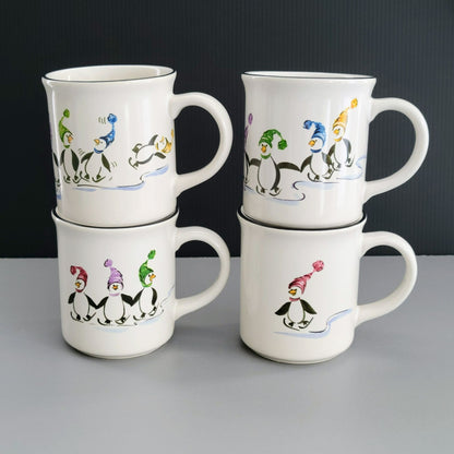 Pfaltzgraff Penguin Skate Mug Set of 4, c.2006-2010