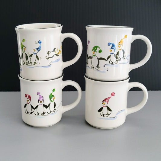 Pfaltzgraff Penguin Skate Mug Set of 4, c.2006-2010