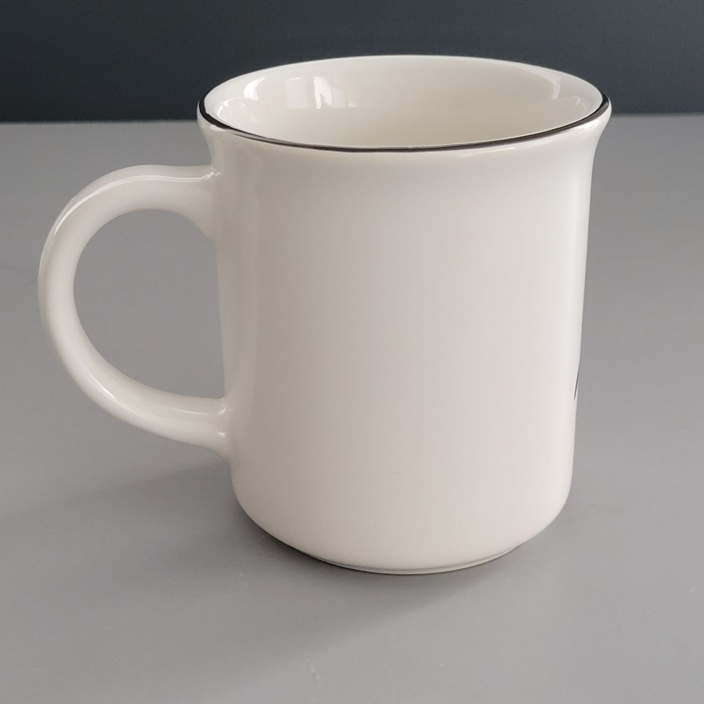 Pfaltzgraff Penguin Skate Mug Set of 4, c.2006-2010