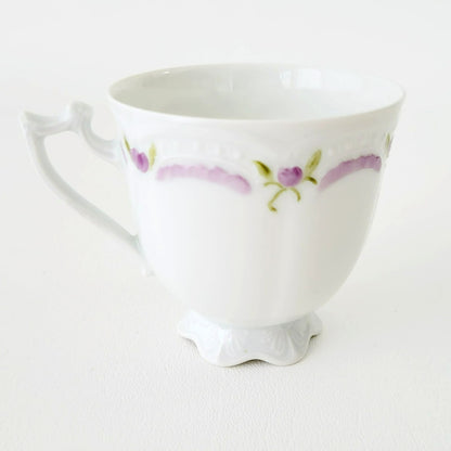 Hutschenreuther Viktoria Teacup & Saucer, White Embossed with Hand Painted Purple & Green Painted Floral, Artist Signed, Germany