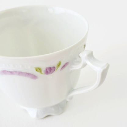 Hutschenreuther Viktoria Teacup & Saucer, White Embossed with Hand Painted Purple & Green Painted Floral, Artist Signed, Germany