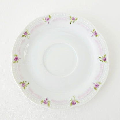 Hutschenreuther Viktoria Teacup & Saucer, White Embossed with Hand Painted Purple & Green Painted Floral, Artist Signed, Germany