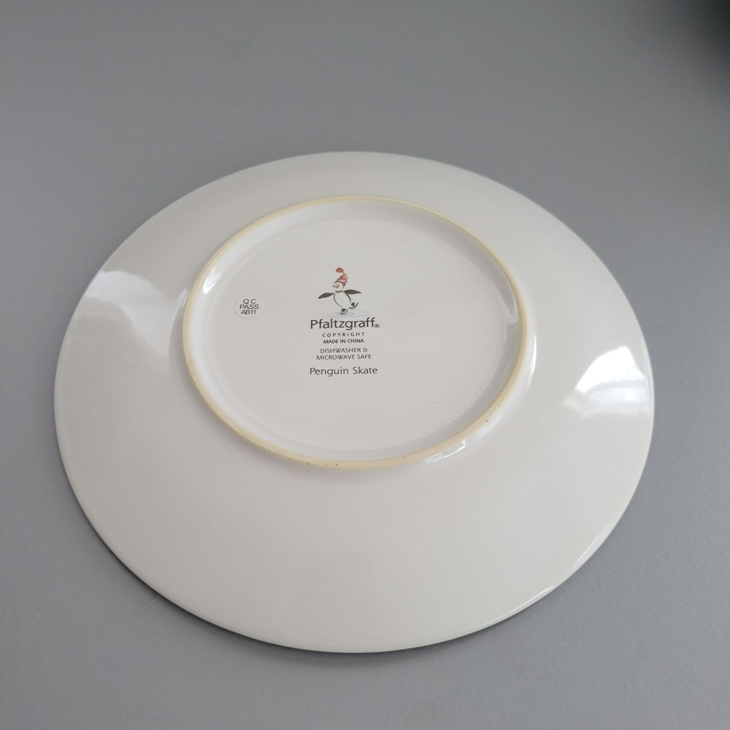 Pfaltzgraff Penguin Skate Salad Plate Set of 4, c.2006-2010