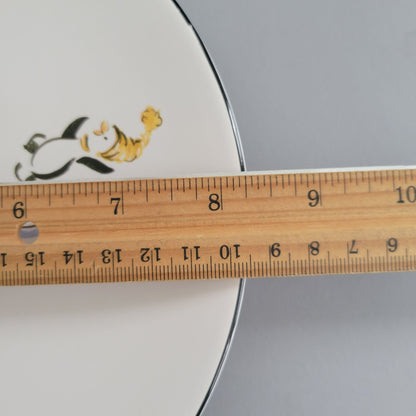 Pfaltzgraff Penguin Skate Salad Plate Set of 4, c.2006-2010